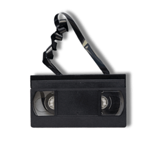 damaged vhs tape with the film coming undone